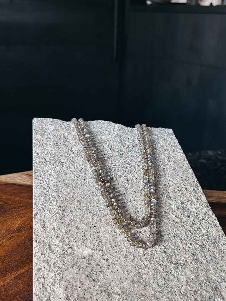 A long glistening labradorite strand handcrafted on Kauai, Hawaii by Patrick Speir.
