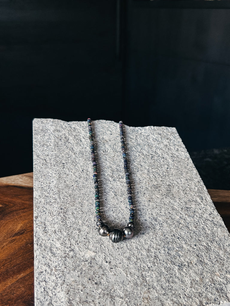 A Black Opal and Tahitian Pearl necklace made by Patrick Spier on the island of Kauai, Hawaii.