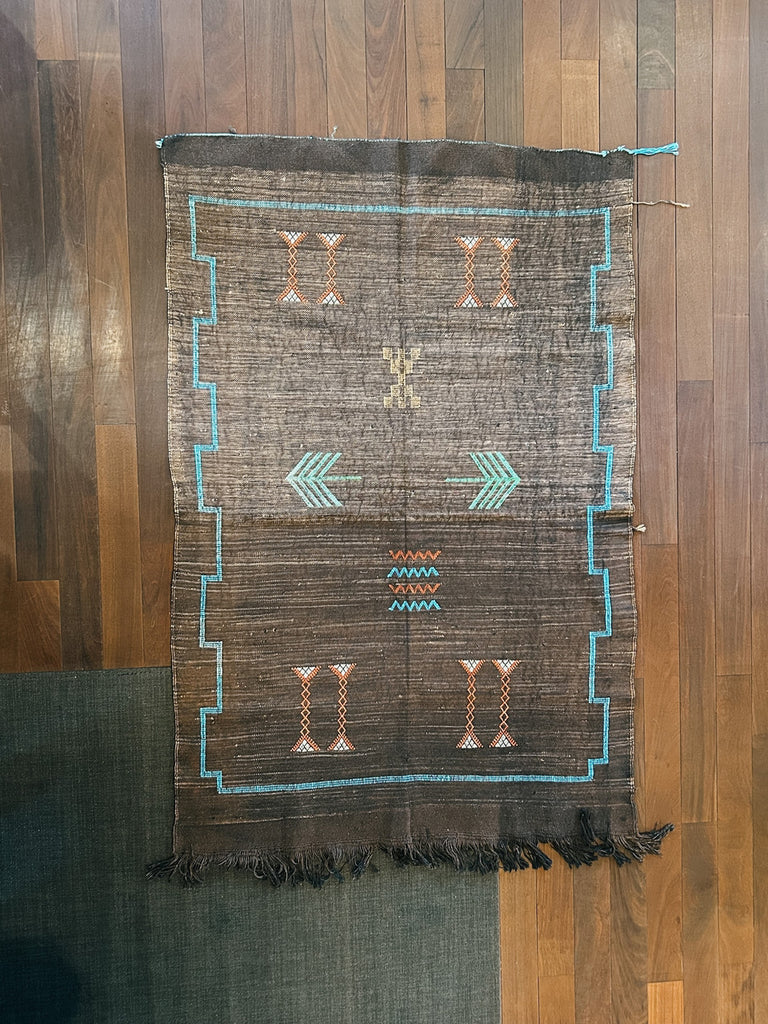 Brown cactus silk rug.