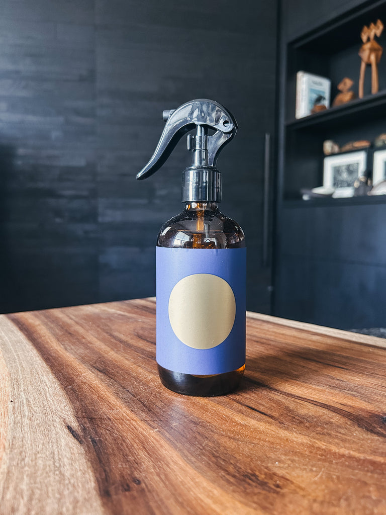 Studio Cuela 10th Anniversary Limited Edition Hiba Wood Atmosphere Mist in amber glass spray bottle.