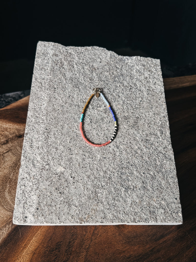 Stacking bracelet with Japanese glass seed beads and 14kt gold-filled clasp.