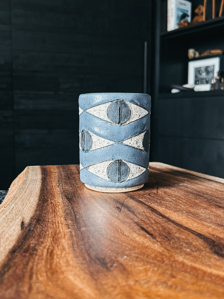 Felix tumbler in slate featuring a hand-etched eye motif by ceramic artist Matthew Ward.
