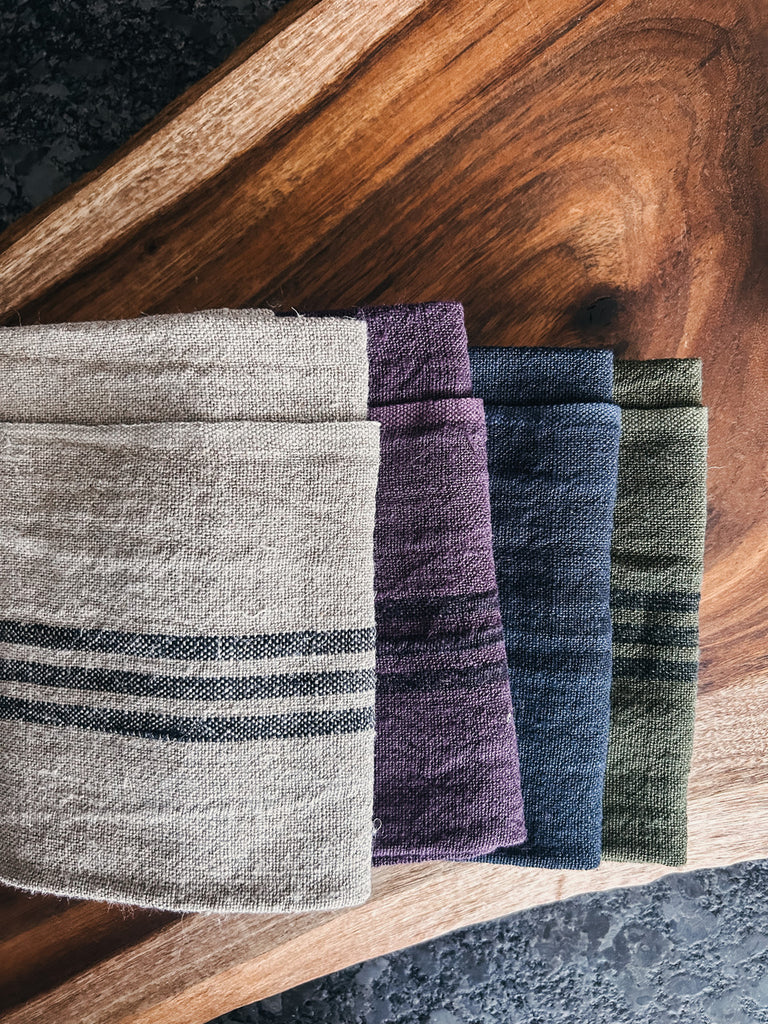 Versatile hand towels by Fig & Bella, made with soft natural fibers and hand-dyed for a unique, artisanal look.