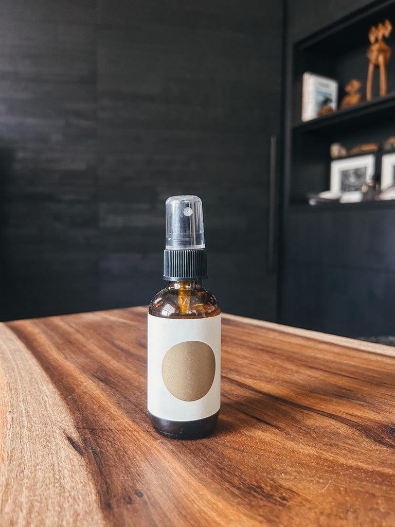 Hiba Wood Mist 52ml bottle by Studio Cuela in amber glass with minimalist label.