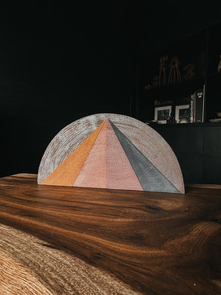 Half-moon Tucker stoneware form hand-painted with rainbow prism.