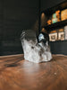 An Arkansas Smoky Quartz Cluster, this powerful and grounding stone is known for its protective and healing properties.