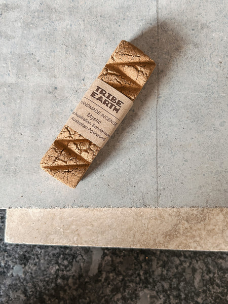 A handmade incense stick crafted from Western Australian sandalwood and agarwood by Tribe Earth.