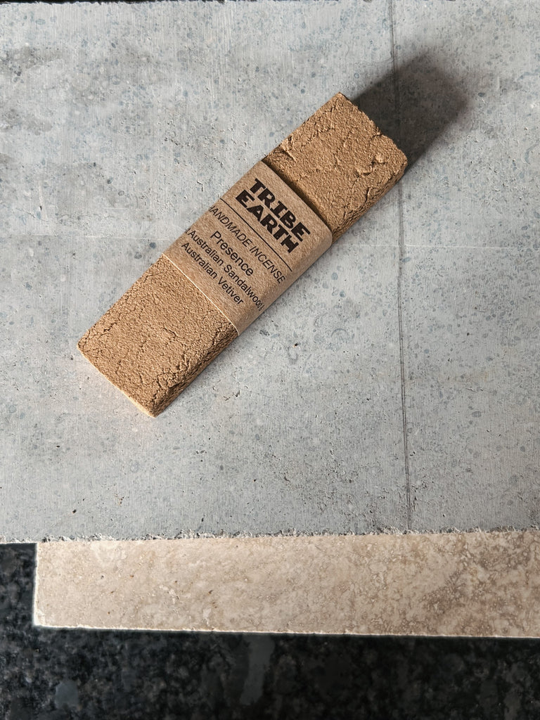 A handmade incense stick crafted from Western Australian sandalwood and vetiver roots by Tribe Earth.