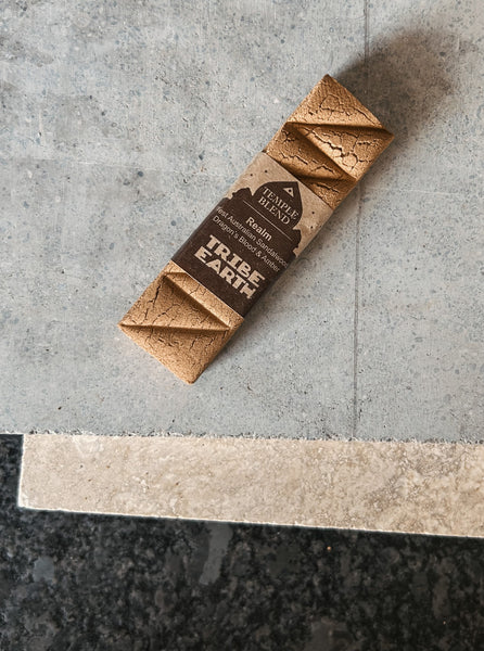 A handmade incense stick crafted from Western Australian sandalwood, dragon’s blood, and amber by Tribe Earth.