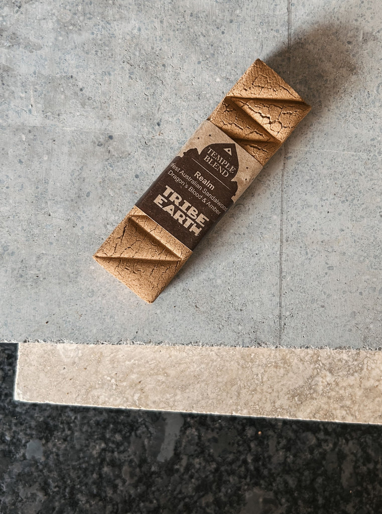 A handmade incense stick crafted from Western Australian sandalwood, dragon’s blood, and amber by Tribe Earth.