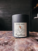 A hand-poured candle inspired by sacred rituals, featuring notes of incense smoke, copal resin, oakwood, and frankincense.