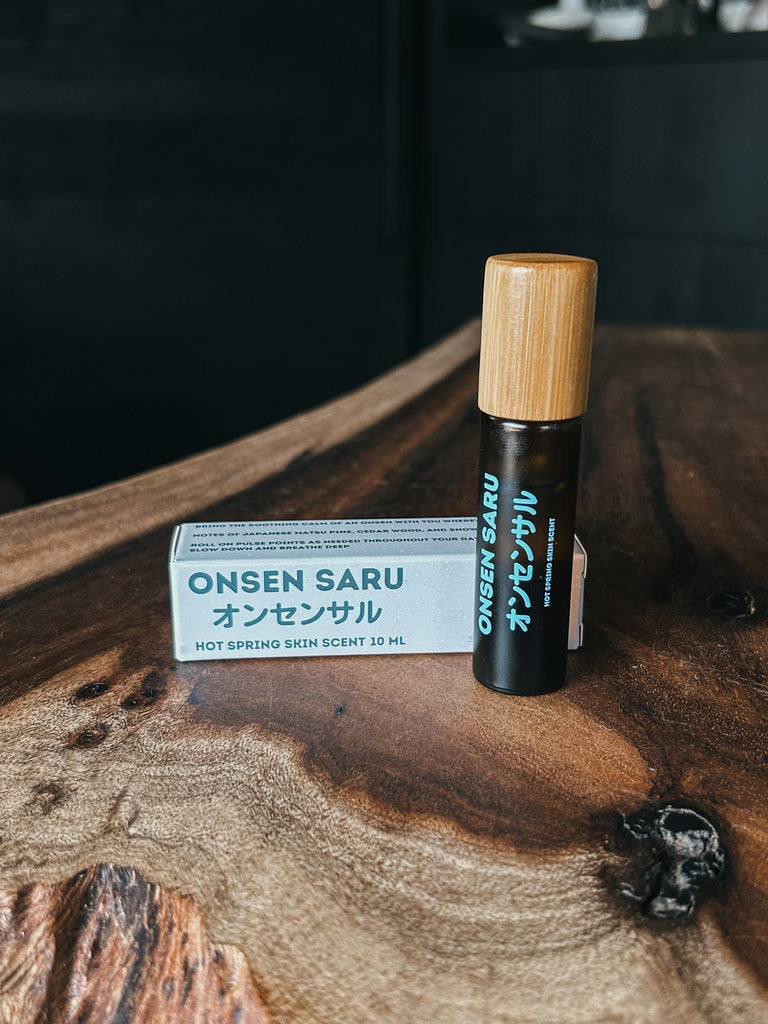 A perfume roller by Onsen Saru. Embodies notes of japanese matsu pine, cedar wood, and snow.