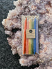 Knot & Bow tall rainbow birthday candles in assorted colors.